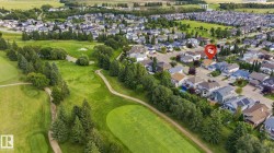 Residential neighborhood bordered by a golf course - 