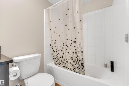 Tub and shower combination with white tile surround - #225 111 Watt Cm Sw, Edmonton, AB 