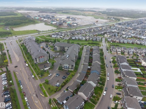 Residential area featuring multiple housing types, including multi-family and single-family residences - #225 111 Watt Cm Sw, Edmonton, AB 