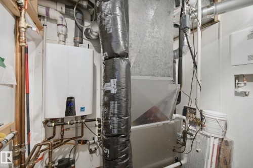 Energy-efficient tankless water heater, copper piping, and a forced-air HVAC system - 12916 63 Street Nw, Edmonton, AB 