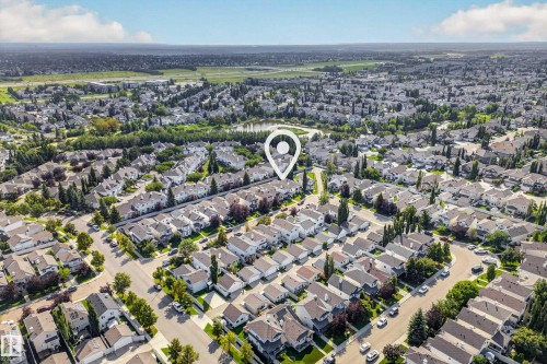 Residential neighborhood featuring mature trees and a distant body of water - 1223 Gillespie Crescent Nw, Edmonton, AB 