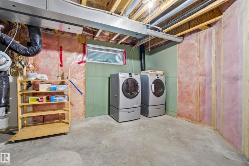 Concrete flooring with exposed ceiling joists - 15213 49A Street Nw, Edmonton, AB 