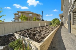 Tiered raised garden beds with wood framing - 