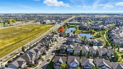 Aerial perspective showcasing a residential development with multiple detached homes - 