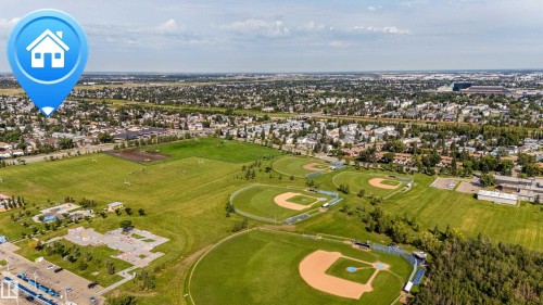 Expansive green spaces featuring multiple baseball diamonds and open fields - 7408 180 Street Nw, Edmonton, AB 