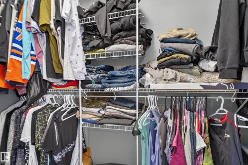 Built-in wire shelving system with multiple hanging rods - 1332 72 Street Sw, Edmonton, AB 