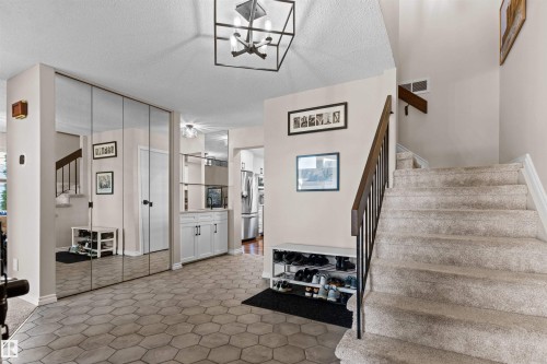Spacious welcoming foyer. - 11118 23A Avenue Nw, Edmonton, AB 