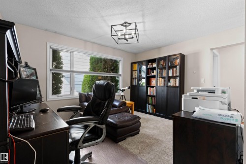 Formal Dining Room is a great flex space. Currently used as a Den/Home Office - 11118 23A Avenue Nw, Edmonton, AB 