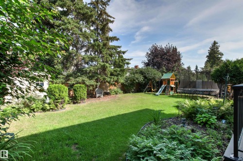 Beautiful park like private yard with plenty of space to garden, play and enjoy. - 11118 23A Avenue Nw, Edmonton, AB 