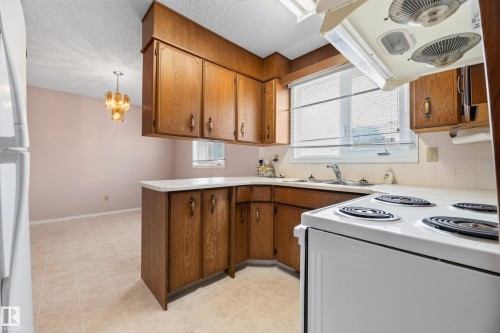 11607 139 Avenue Nw, Edmonton, AB - Indoor Photo Showing Kitchen With Double Sink