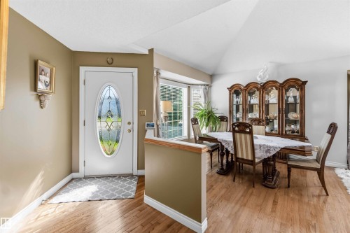 Entryway featuring a decorative glass-insert door - 522 Klarvatten Lake Wynd Nw, Edmonton, AB 