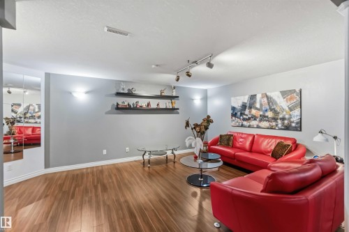 Wood-finish flooring throughout - 522 Klarvatten Lake Wynd Nw, Edmonton, AB 
