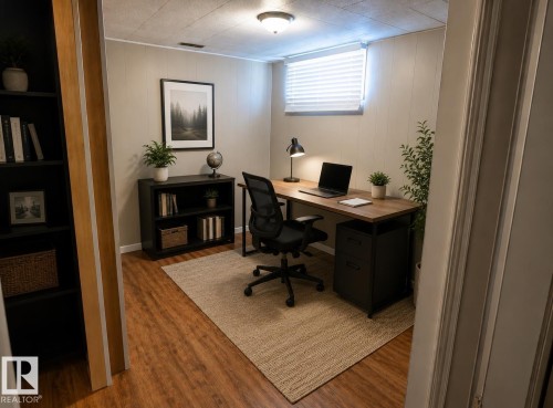 Recessed lighting, wood-finish flooring, and white paneling on perimeter walls - 10439 36A Ave Nw, Edmonton, AB 