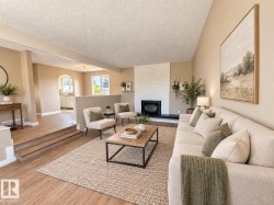 White brick fireplace with dark hearth and mantel - 
