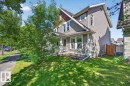 Two-story residence featuring horizontal siding and contrasting shingle accents - 1217 76 Street Sw, Edmonton, AB 