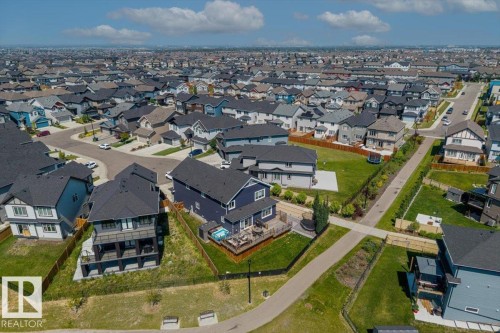 Aerial perspective showcasing a residential neighborhood with varied architectural styles - 5203 23A Avenue Sw, Edmonton, AB - Outdoor With View