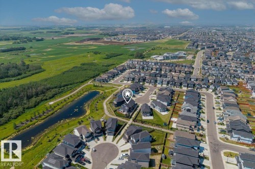 Aerial perspective showcasing a structured residential development - 5203 23A Avenue Sw, Edmonton, AB - Outdoor With View