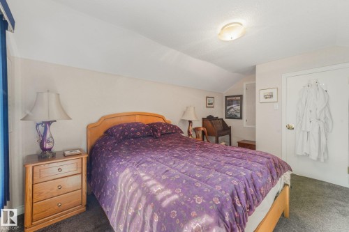 2nd bedroom is Carpeted room with sloped ceilings, - 10531 137 Street Nw, Edmonton, AB 