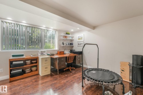 3rd bedroom located on the 4th level featuring large windows. - 10531 137 Street Nw, Edmonton, AB 