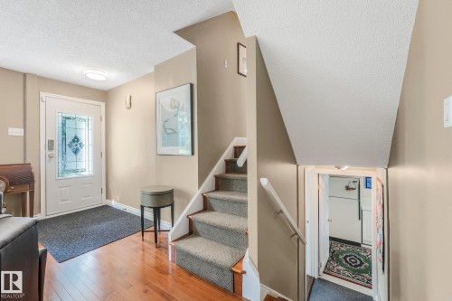 Bright foyer with maple hardwood floors. - 10531 137 Street Nw, Edmonton, AB 