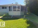 Screened-in porch with multiple windows - 9504 63 Avenue Nw, Edmonton, AB 