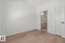 Vaulted ceiling with wood-finish flooring - 