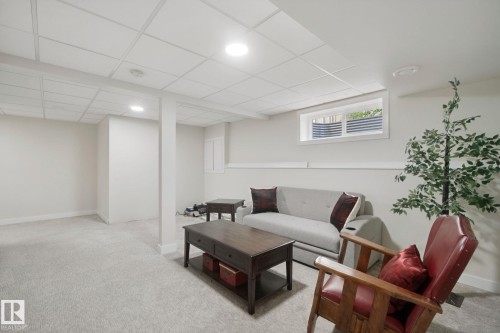 Recessed lighting, drop ceiling, and light-toned carpeting - 15618 141 Street Nw, Edmonton, AB 