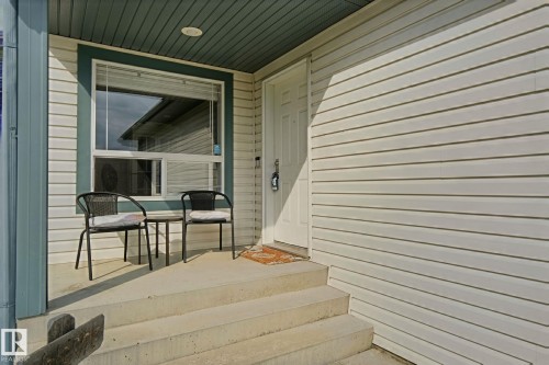 Front entry with concrete steps and landing - 15618 141 Street Nw, Edmonton, AB 