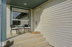 Front entry with concrete steps and landing - 