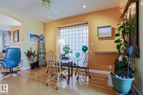 Wood-finish flooring, recessed lighting, and a ceiling fan - 10814 125 Street Nw, Edmonton, AB 
