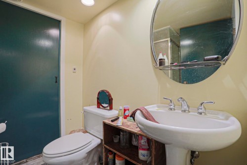 Pedestal sink with chrome-finish faucet - 10814 125 Street Nw, Edmonton, AB 