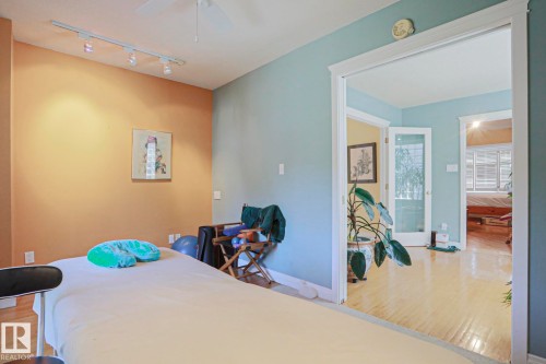 Hardwood-finish flooring, recessed lighting, and a ceiling fan - 10814 125 Street Nw, Edmonton, AB 