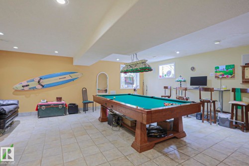 Recreational space featuring tile flooring, recessed lighting, and a built-in window - 10814 125 Street Nw, Edmonton, AB 