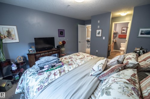 #124 300 Spruce Ridge Rd, Spruce Grove, AB - Indoor Photo Showing Bedroom