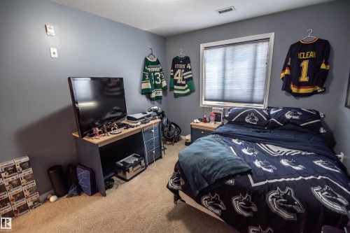 #124 300 Spruce Ridge Rd, Spruce Grove, AB - Indoor Photo Showing Bedroom