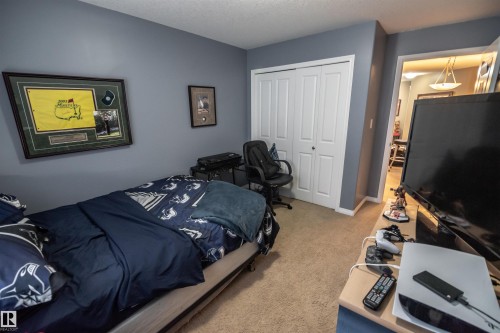 #124 300 Spruce Ridge Rd, Spruce Grove, AB - Indoor Photo Showing Bedroom