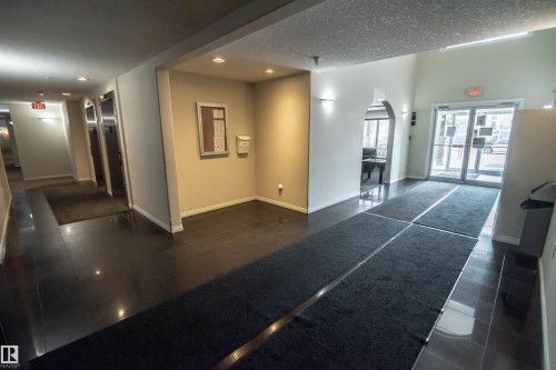 lobby - #124 300 Spruce Ridge Rd, Spruce Grove, AB - Indoor Photo Showing Other Room