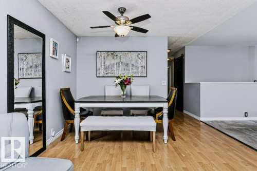 Wood-finish flooring throughout the space - 18431 95A Avenue Nw, Edmonton, AB 