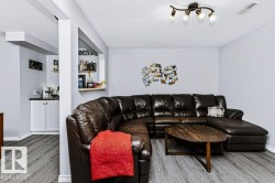 Recessed nook with built-in white cabinetry and a dark countertop - 