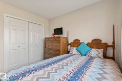 Neutral wall color, baseboard molding, and wood-finish flooring - 