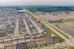 Aerial perspective showcasing a residential neighborhood with varied housing styles - 