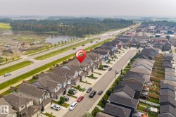 Aerial perspective showcasing a residential community with a consistent architectural style - 