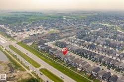 Aerial view showcasing a residential neighborhood with varied housing styles - 
