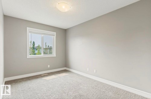 Light gray wall tones with white trim throughout - 79 Catalina Crest, Fort Saskatchewan, AB - Indoor Photo Showing Other Room