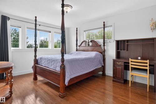 Hardwood flooring, recessed lighting, and multiple windows with white trim - 1251 Summerside Drive Sw, Edmonton, AB 