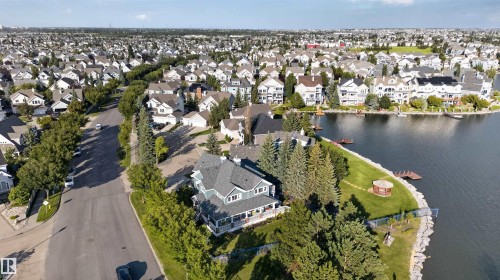 Waterfront property with a private dock, expansive green space, and a charming gazebo - 1251 Summerside Drive Sw, Edmonton, AB 