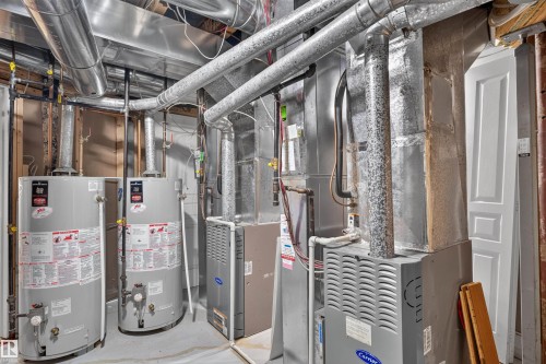 Dual water heaters and HVAC units providing comprehensive climate control - 1251 Summerside Drive Sw, Edmonton, AB 