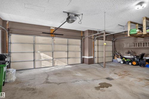 Two garage bays with overhead doors - 1251 Summerside Drive Sw, Edmonton, AB 