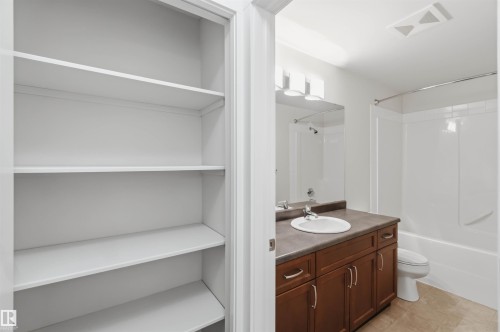 storage closet between 2nd bedroom & bathroom - #111 4922 52 St, Gibbons, AB 