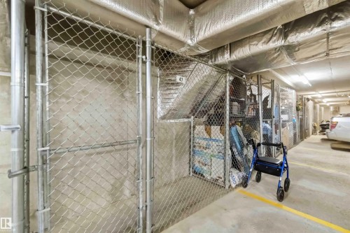 storage cage in front of parking stall - #111 4922 52 St, Gibbons, AB 